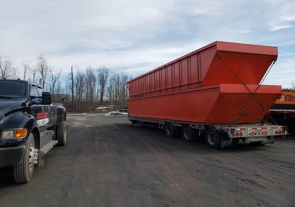Barge-Builders-New-Inventory-shows-new-red-barges-on-top-of-each-other.jpg